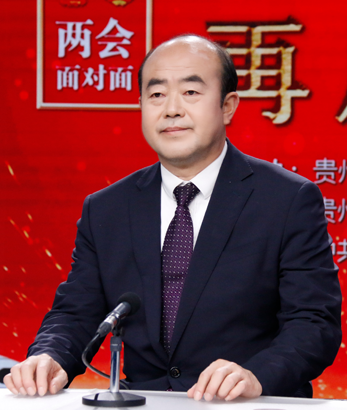 省政协委员，黔西南州政协副主席、州生态移民局局长王尧忠.png